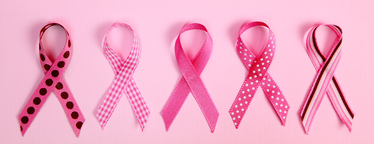 pink ribbons on pink background