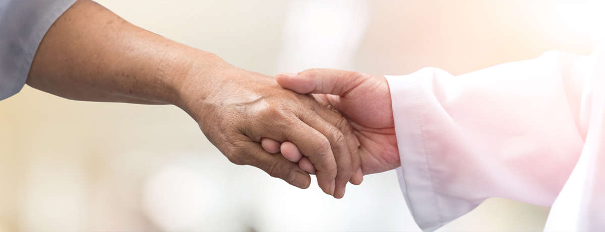 close up of two hands clasping