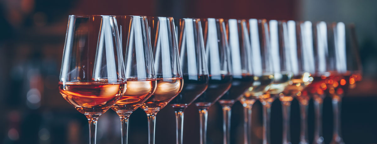 lineup of wine glasses
