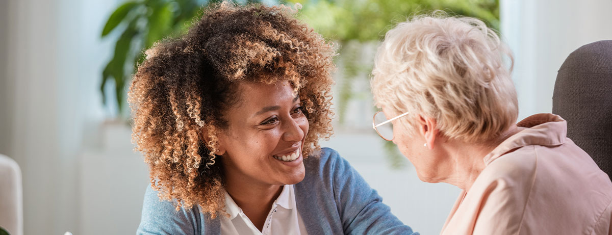 woman smiling at senior