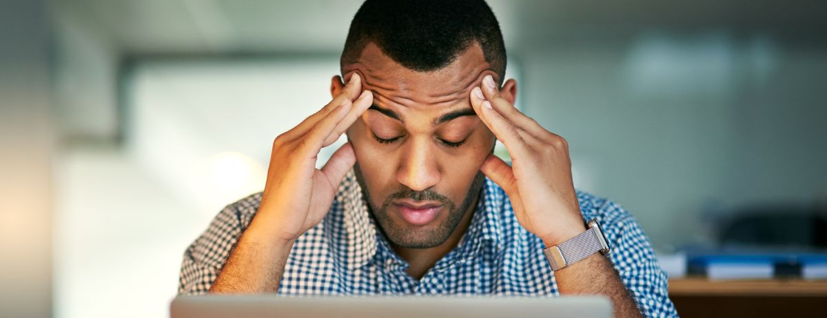 man stressed at work