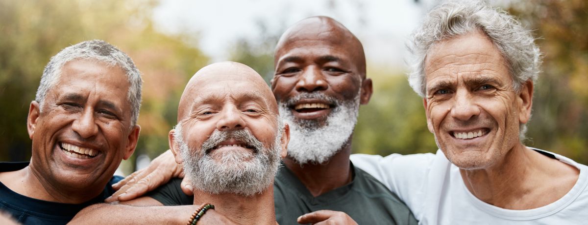 Group of men smiling