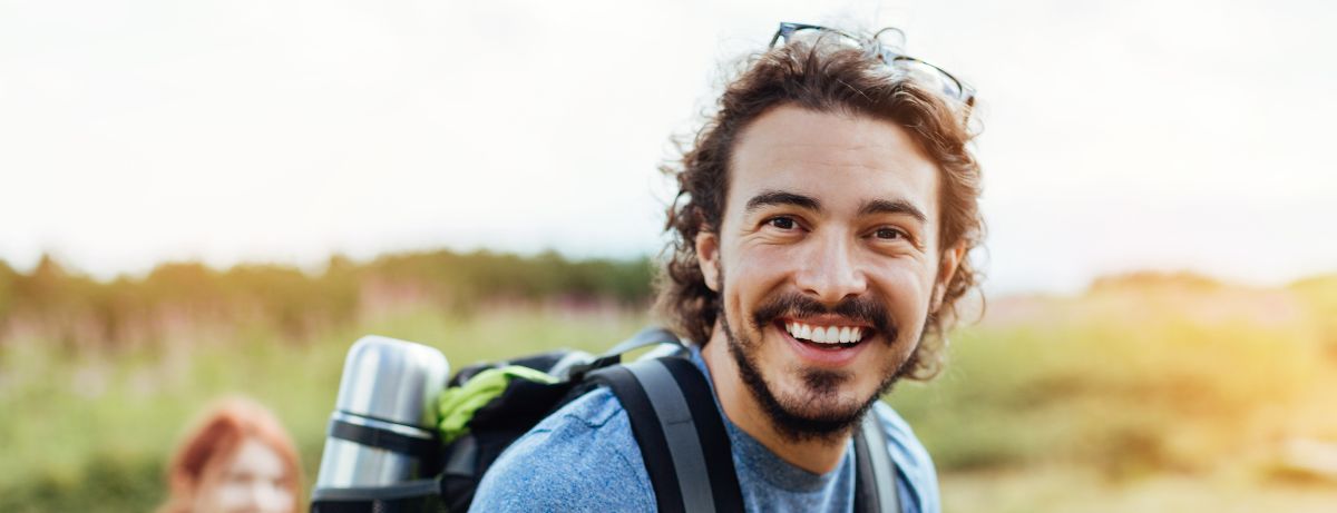 man in blue hiking