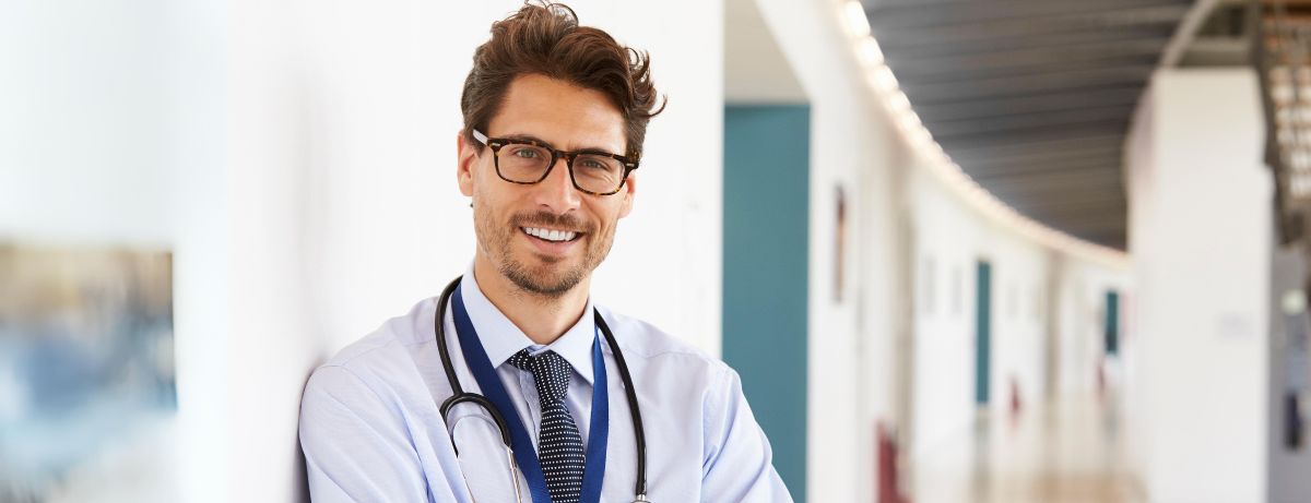 Male doctor smiling