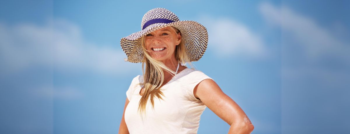 woman in large sun hat